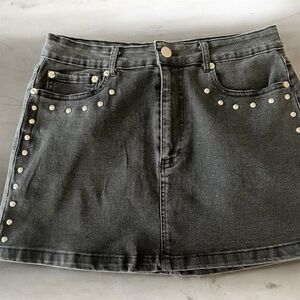 The workshop black faded denim skirt with stud embellishments.. size M